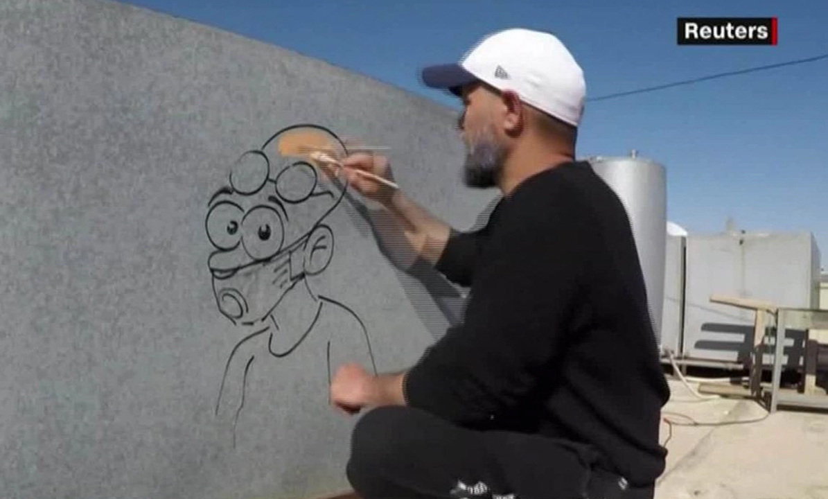En Jordania vecinos crear obras de arte en un edificio